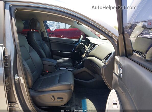 KM8J33A41HU536602 2017 HYUNDAI TUCSON Gray წინა სალონის ხედი