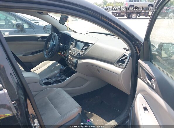 KM8J33A41JU750883 2018 HYUNDAI TUCSON Black Front interior view