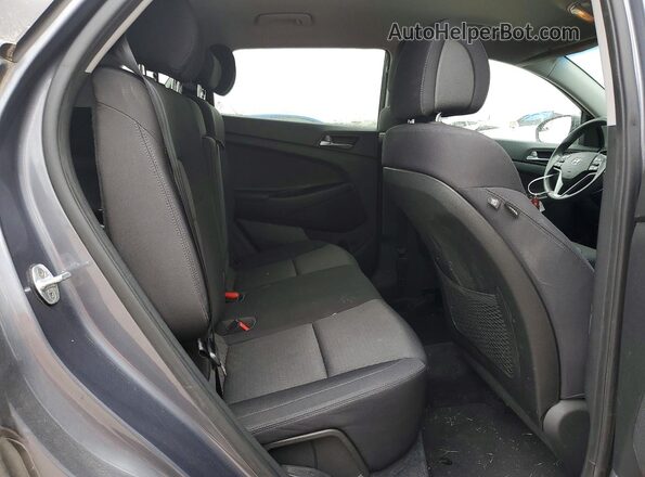 KM8J33A44HU413280 2017 HYUNDAI TUCSON Gray Vista de los asientos traseros