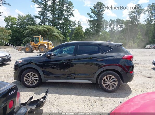 KM8J33A44HU474581 2017 HYUNDAI TUCSON Black Вид задньої частини салону