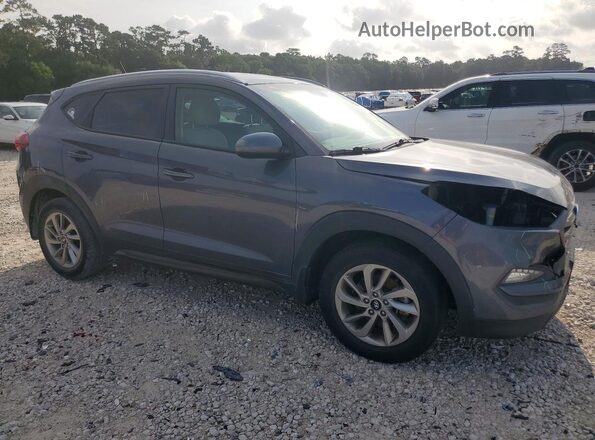 KM8J33A45GU160727 2016 HYUNDAI TUCSON Gray Front right