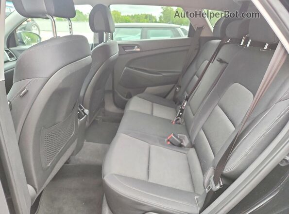 KM8J33A45GU185689 2016 HYUNDAI TUCSON Black უკანა სალონის ხედი