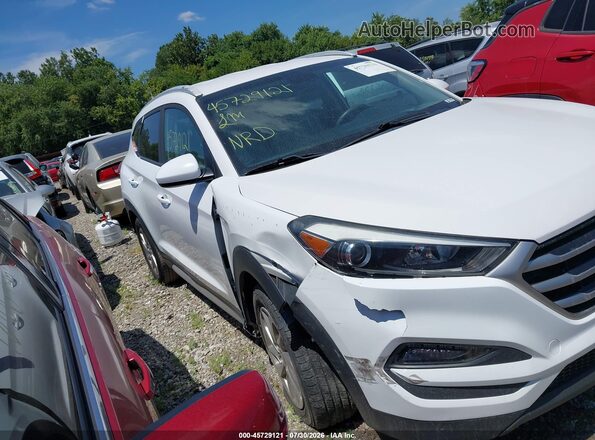 KM8J33A45JU694589 2018 HYUNDAI TUCSON White უკანა სალონის ხედი