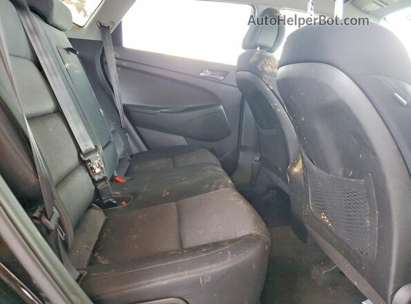 KM8J33A46GU076724 2016 HYUNDAI TUCSON Black Vista de los asientos traseros