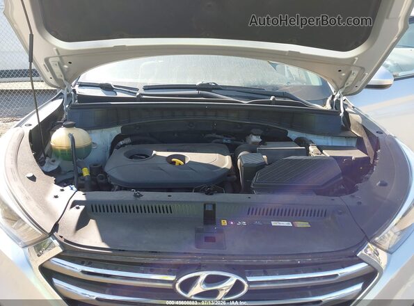 KM8J33A46JU669488 2018 HYUNDAI TUCSON Silver Rear view