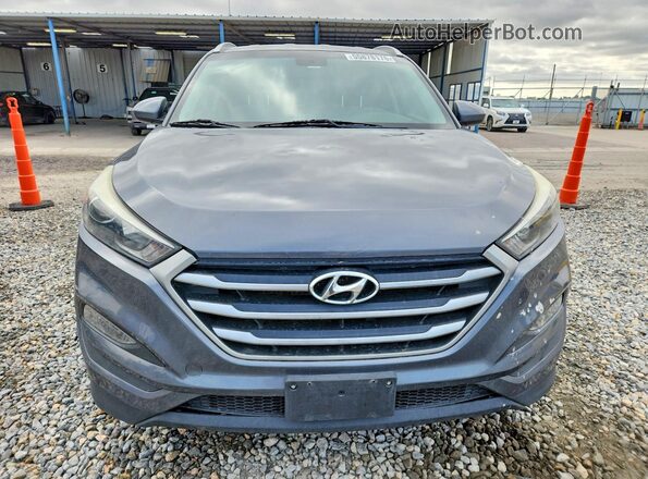 KM8J33A46JU691331 2018 HYUNDAI TUCSON Gray Front view