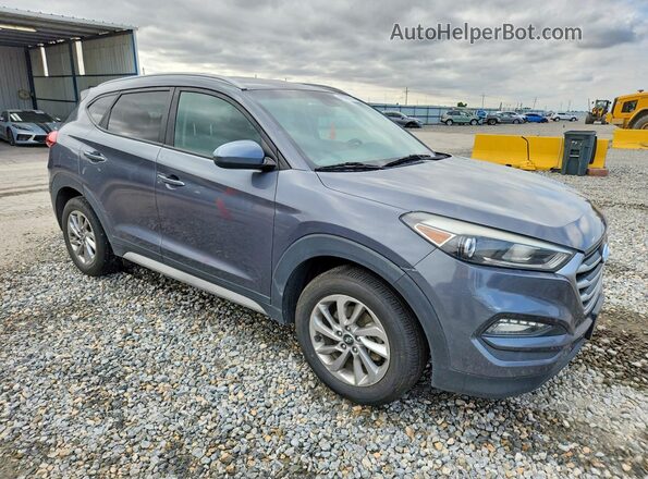 KM8J33A46JU691331 2018 HYUNDAI TUCSON Gray Front right