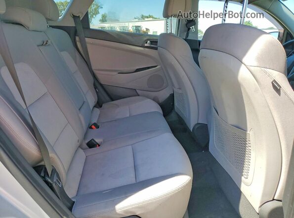 KM8J33A48GU130864 2016 HYUNDAI TUCSON Silver უკანა სალონის ხედი