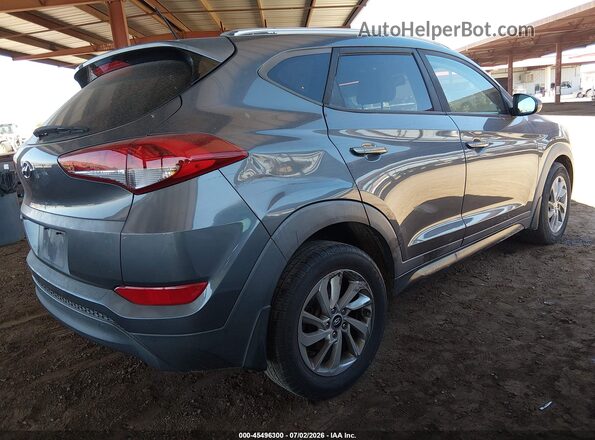 KM8J33A48GU180812 2016 HYUNDAI TUCSON Gray უკანა მარჯვენა