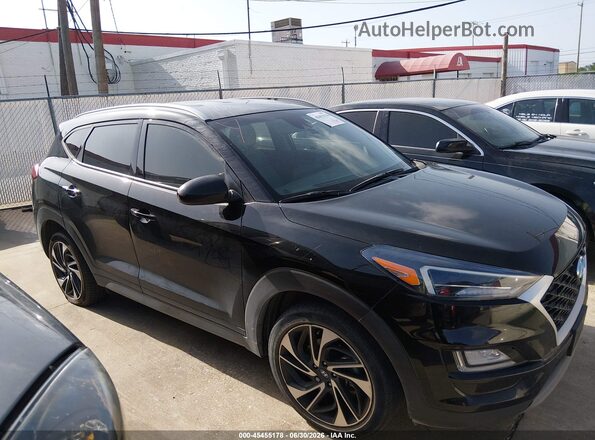 KM8J33AL0MU412287 2021 HYUNDAI TUCSON Black Սալոնի հետևի տեսք