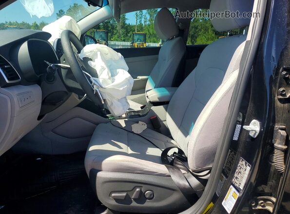 KM8J33AL2KU051402 2019 HYUNDAI TUCSON Silver Front interior view