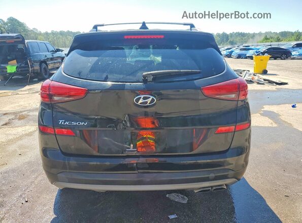 KM8J33AL2KU051402 2019 HYUNDAI TUCSON Silver Rear view