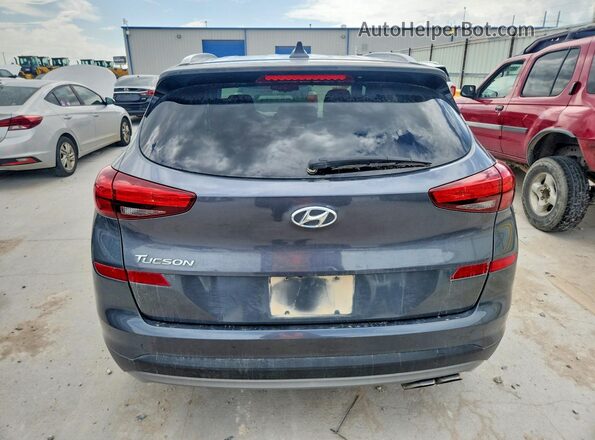 KM8J33AL2KU915011 2019 HYUNDAI TUCSON Серый Вид сзади