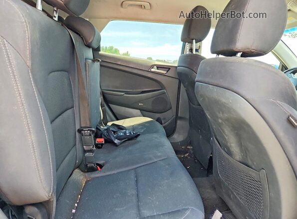 KM8J33AL2KU981414 2019 HYUNDAI TUCSON Blue Vista interior trasera