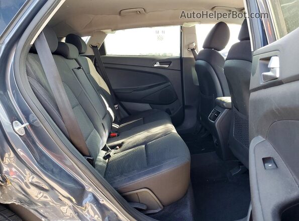 KM8J33AL3KU958868 2019 HYUNDAI TUCSON Gray უკანა სალონის ხედი
