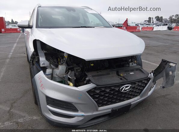 KM8J33AL6KU038667 2019 HYUNDAI TUCSON Серебряный Вид задней части салона