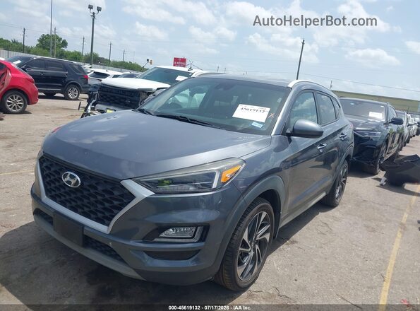 KM8J33AL6KU980766 2019 HYUNDAI TUCSON Серый Передняя левая четверть