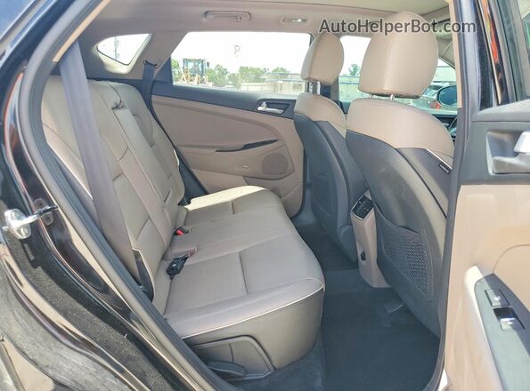 KM8J33AL6MU305342 2021 HYUNDAI TUCSON Black Rear seats view