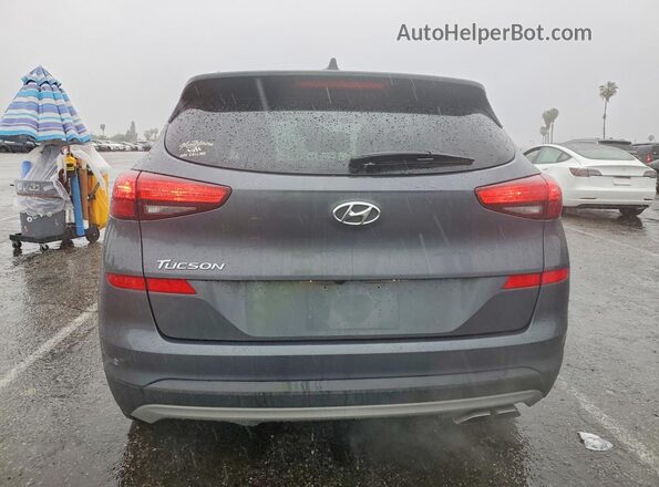 KM8J33AL7KU879199 2019 HYUNDAI TUCSON Gray Widok z tyłu