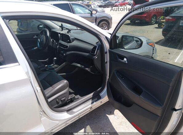 KM8J33AL8KU908645 2019 HYUNDAI TUCSON Silver წინა სალონის ხედი