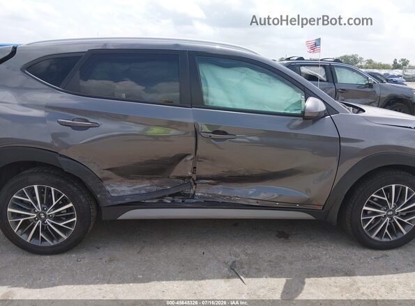 KM8J33AL8MU350170 2021 HYUNDAI TUCSON Gray Front interior view