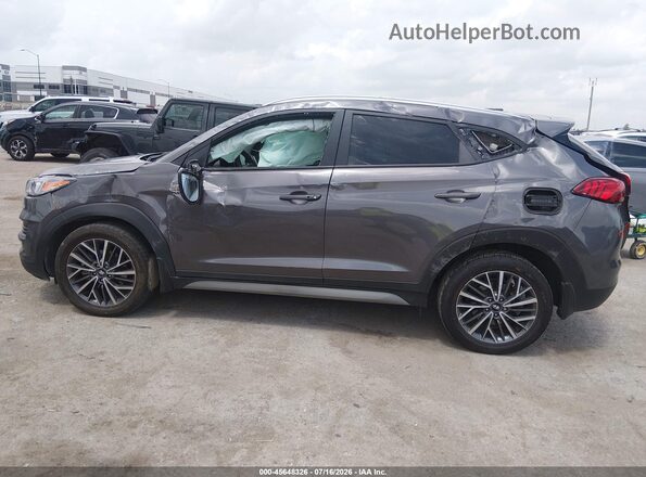 KM8J33AL8MU350170 2021 HYUNDAI TUCSON Gray Rear interior view