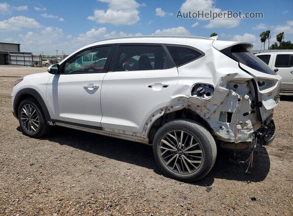 KM8J33AL9MU409954 2021 HYUNDAI TUCSON White Trasero izquierdo