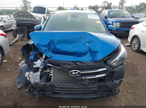 KM8J33ALXJU822901 2018 HYUNDAI TUCSON Blue უკანა სალონის ხედი