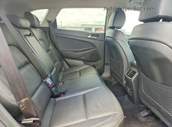 KM8J33ALXKU945146 2019 HYUNDAI TUCSON Blue უკანა სალონის ხედი