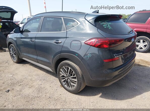 KM8J33ALXMU368184 2021 HYUNDAI TUCSON Gray Trasero izquierdo