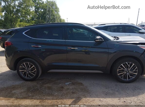KM8J33ALXMU368184 2021 HYUNDAI TUCSON Gray Vista interior trasera