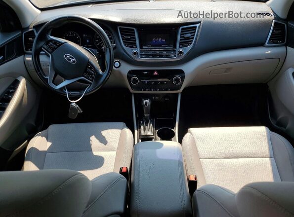 KM8J3CA20GU150895 2016 HYUNDAI TUCSON Gray Dashboard view