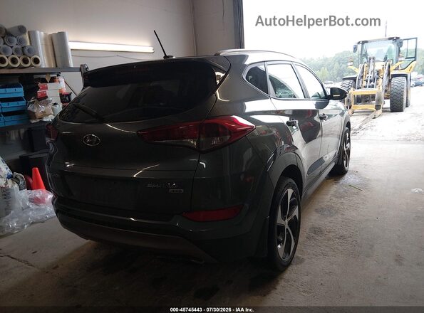 KM8J3CA20GU219875 2016 HYUNDAI TUCSON Gray Trasero derecho