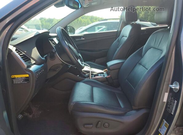 KM8J3CA20GU239558 2016 HYUNDAI TUCSON Gray წინა სალონის ხედი