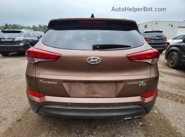 KM8J3CA21GU038459 2016 HYUNDAI TUCSON Brown Vista trasera