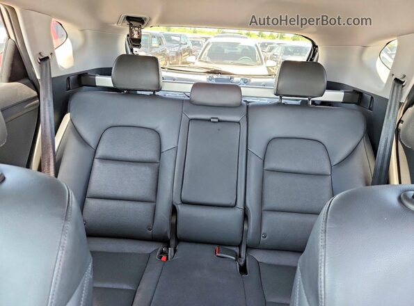 KM8J3CA21GU102418 2016 HYUNDAI TUCSON Silver Հետևի նստատեղերի տեսք