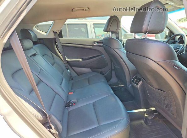 KM8J3CA21GU102418 2016 HYUNDAI TUCSON Silver Սալոնի հետևի տեսք