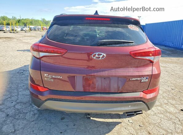 KM8J3CA22GU128235 2016 HYUNDAI TUCSON Maroon Widok z tyłu