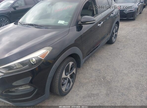 KM8J3CA23GU070281 2016 HYUNDAI TUCSON Black Դիմացի տեսք