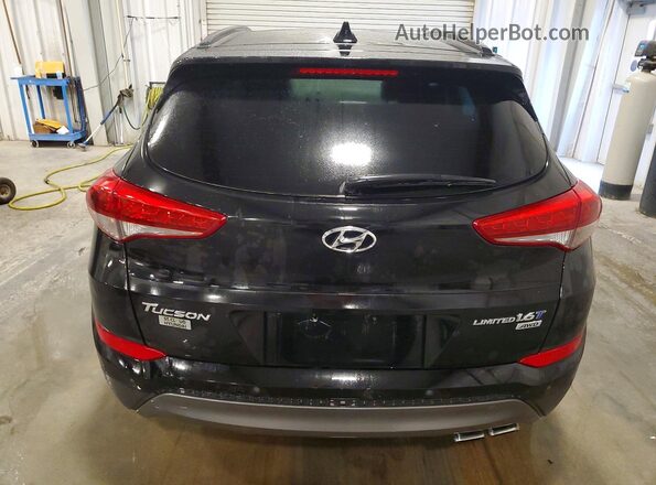 KM8J3CA23GU074198 2016 HYUNDAI TUCSON Black Vista trasera