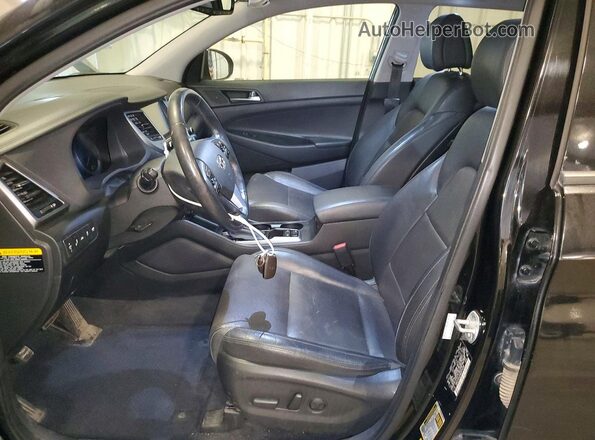 KM8J3CA23GU074198 2016 HYUNDAI TUCSON Black Vista interior delantera