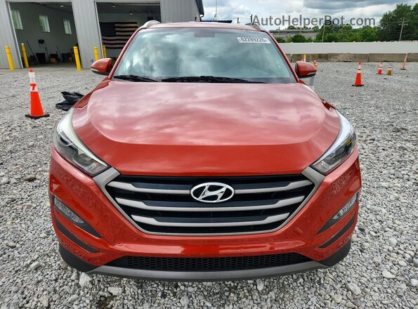 KM8J3CA24GU069222 2016 HYUNDAI TUCSON Orange Widok z przodu
