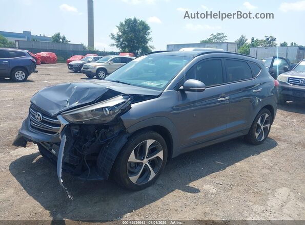 KM8J3CA26GU024802 2016 HYUNDAI TUCSON Серый Передняя левая четверть