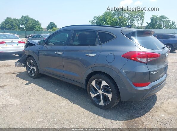 KM8J3CA26GU024802 2016 HYUNDAI TUCSON Серый Задняя левая четверть