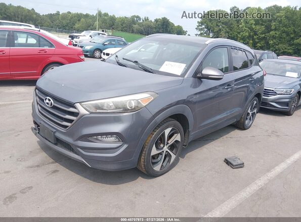 KM8J3CA27GU080330 2016 HYUNDAI TUCSON Gray წინა მარცხენა ხედი სამი მეოთხედიდან