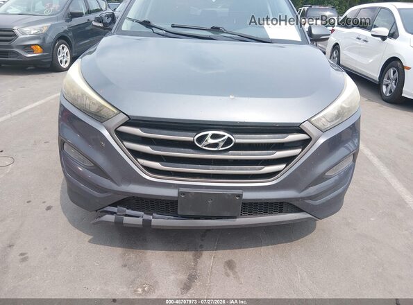 KM8J3CA27GU080330 2016 HYUNDAI TUCSON Gray წინა ხედი