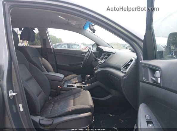 KM8J3CA27GU080330 2016 HYUNDAI TUCSON Gray წინა სალონის ხედი