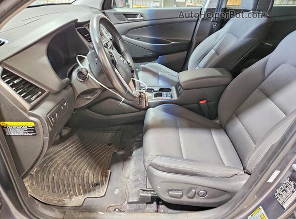KM8J3CA27HU498744 2017 HYUNDAI TUCSON Серый Вид салона спереди