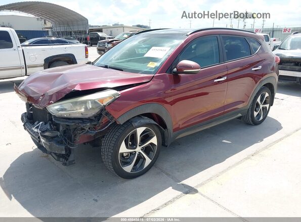 KM8J3CA28GU042220 2016 HYUNDAI TUCSON Maroon Vista tres cuartos delantera izquierda