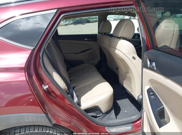 KM8J3CA28GU042220 2016 HYUNDAI TUCSON Maroon Vista de la etiqueta del VIN